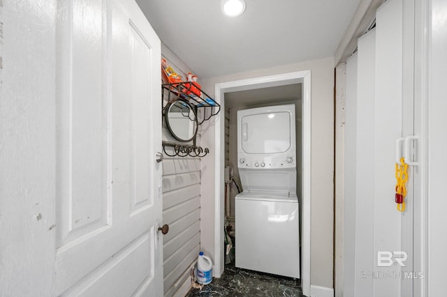 2550 Springhill Ave, Mobile, AL 36607 - washroom with marble finish floor, stacked washer / drying machine, and laundry area