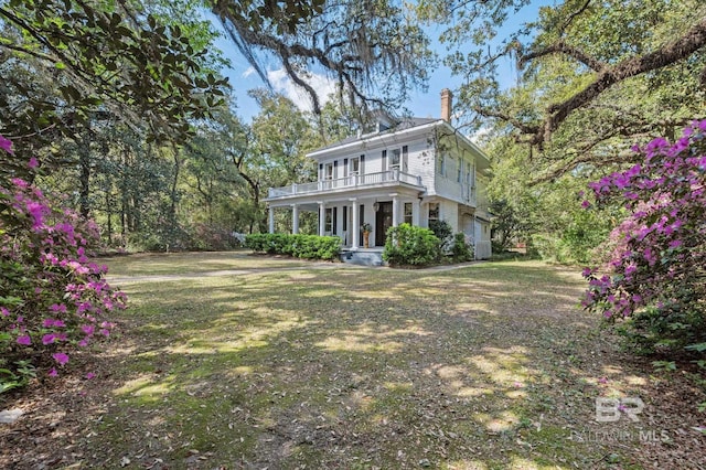 2550 Springhill Ave, Mobile, AL 36607 - view of front facade featuring a chimney, a front lawn, and a balcony