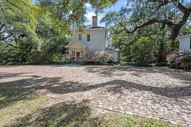 2550 Springhill Ave, Mobile, AL 36607 - back of house with a chimney