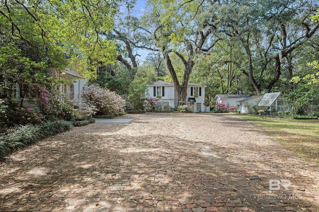 2550 Springhill Ave, Mobile, AL 36607 - view of front of home featuring an exterior structure, an outbuilding, and decorative driveway