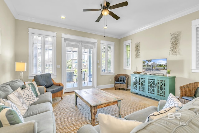 living room with french doors, recessed lighting, baseboards, ornamental molding, and ceiling fan