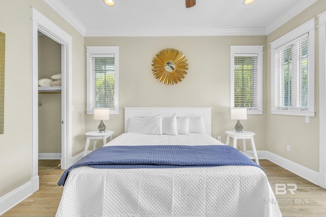 bedroom with recessed lighting, baseboards, and light wood-style floors