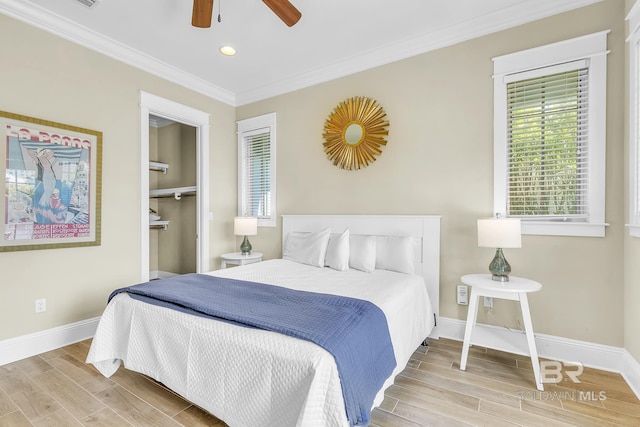 bedroom with ornamental molding, baseboards, recessed lighting, and wood finished floors