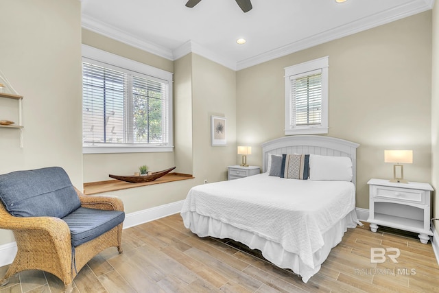 bedroom featuring baseboards, recessed lighting, light wood-style floors, and crown molding