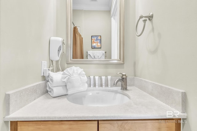 8620 Greenwich Ct Unit Cottage 9, Gulf Shores, AL 36542 - bathroom featuring ornamental molding and vanity