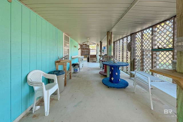 view of patio featuring ceiling fan
