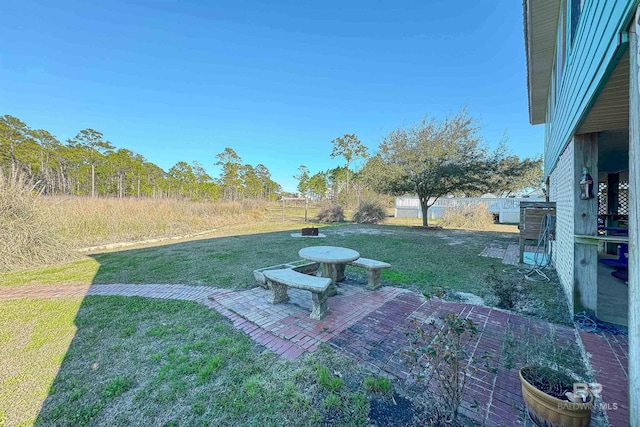 view of yard featuring a patio area and fence