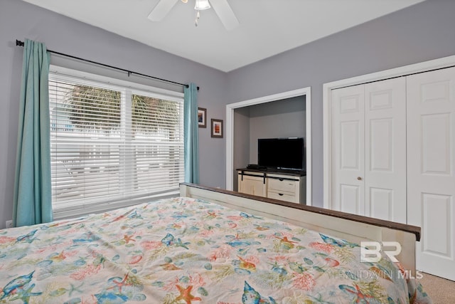 unfurnished bedroom with carpet flooring, a closet, and ceiling fan