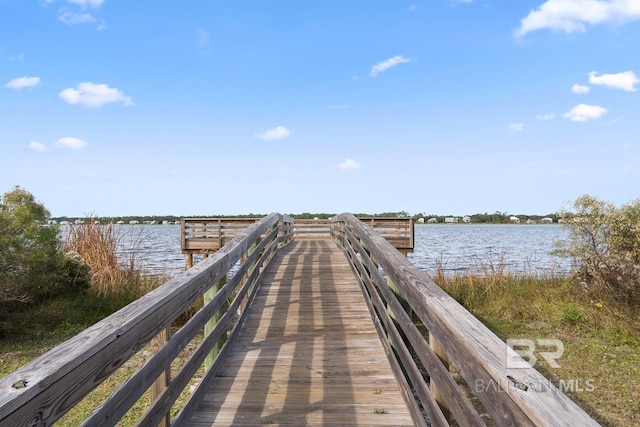 view of dock with a water view