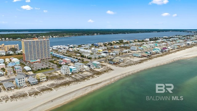 aerial view featuring a water view and a beach view