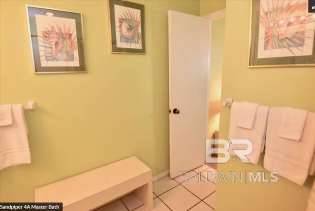 bathroom with tile patterned flooring