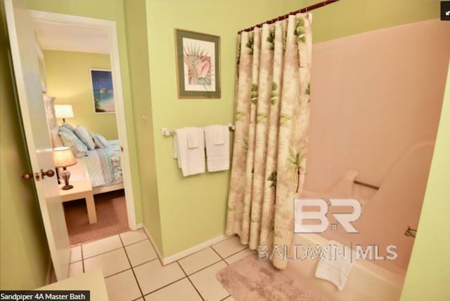 bathroom with tile patterned flooring