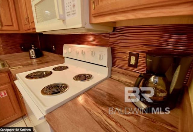 kitchen featuring white appliances