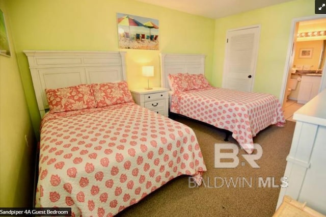 1069 W Beach Blvd Unit 4-A, Gulf Shores, AL 36542 - carpeted bedroom with connected bathroom