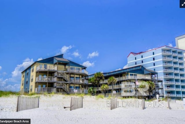 1069 W Beach Blvd Unit 4-A, Gulf Shores, AL 36542 - view of apartment building / complex