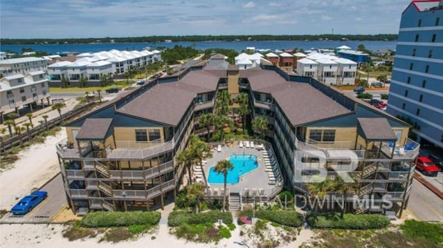 birds eye view of property featuring a water view