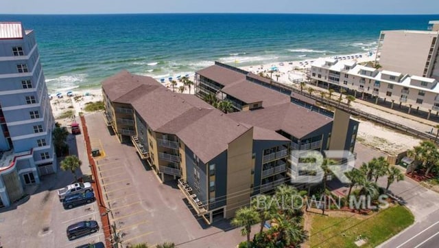 aerial view featuring a beach view and a water view