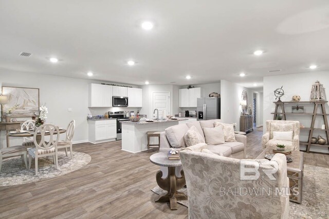 living room featuring light wood-type flooring