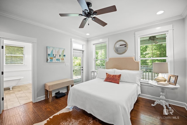 bedroom with crown molding, wood-type flooring, and multiple windows