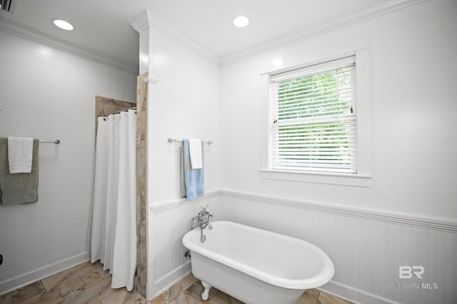 full bathroom with a tile shower, wainscoting, ornamental molding, and a soaking tub