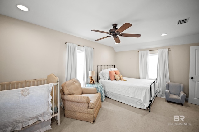 carpeted bedroom featuring visible vents, a ceiling fan, and recessed lighting