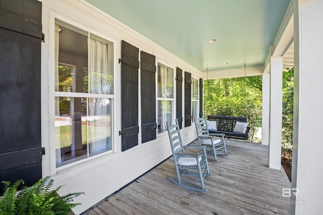wooden terrace featuring a porch