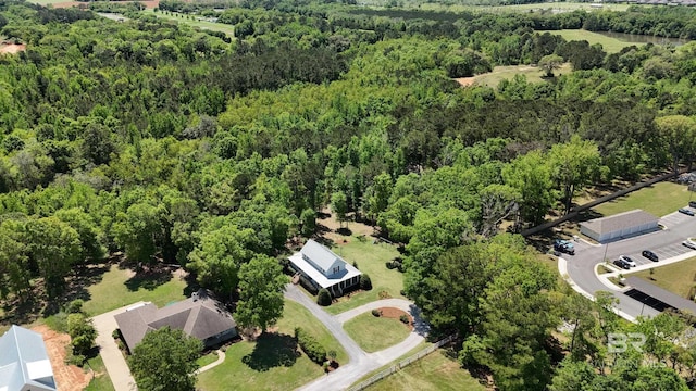 drone / aerial view with a view of trees