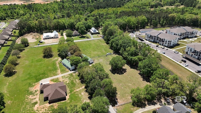aerial view with a view of trees and a residential view