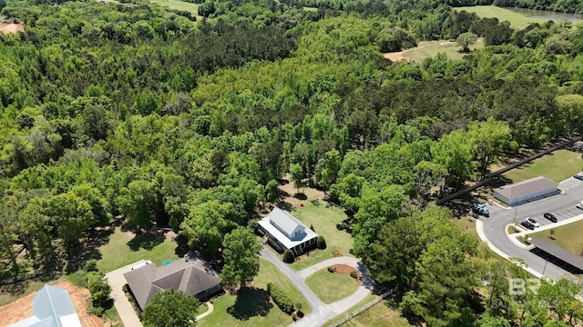 drone / aerial view with a forest view
