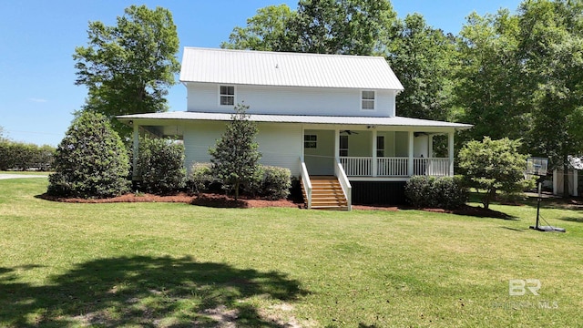 view of front of home featuring a ceiling fan, a front yard, a porch, stairs, and metal roof