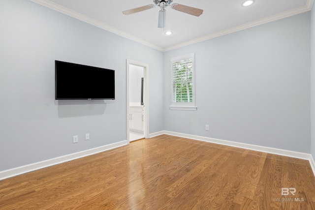 empty room with a ceiling fan, wood finished floors, baseboards, ornamental molding, and recessed lighting