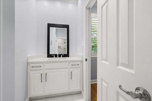 bathroom featuring vanity and baseboards