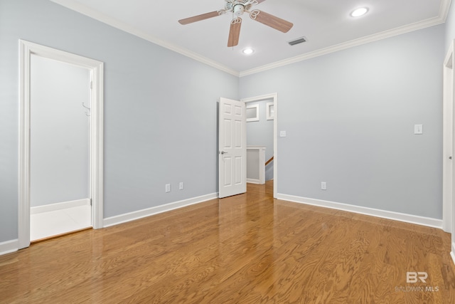 30595 Laurel Ct, Daphne, AL 36527 - unfurnished bedroom featuring visible vents, crown molding, wood finished floors, baseboards, and recessed lighting
