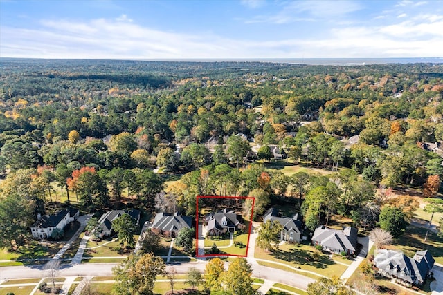 bird's eye view with a view of trees and a residential view