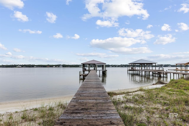 2282 W W Beach Blvd, Gulf Shores, AL 36542 - dock featuring boat lift and a water view
