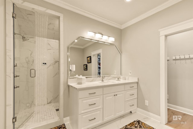 2282 W W Beach Blvd, Gulf Shores, AL 36542 - full bath featuring a marble finish shower, marble look tiles, crown molding, vanity, and a walk in closet