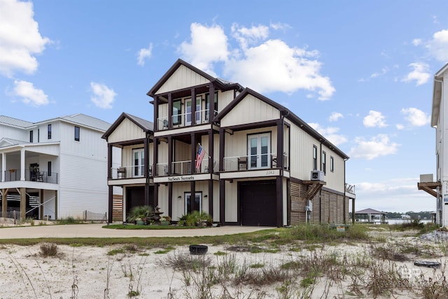 2282 W W Beach Blvd, Gulf Shores, AL 36542 - view of front of house with a balcony and an attached garage