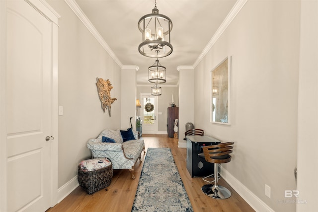2282 W W Beach Blvd, Gulf Shores, AL 36542 - corridor featuring a chandelier, ornamental molding, and wood finished floors
