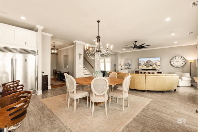 2282 W W Beach Blvd, Gulf Shores, AL 36542 - dining area with a chandelier, ornamental molding, a ceiling fan, recessed lighting, and stairs