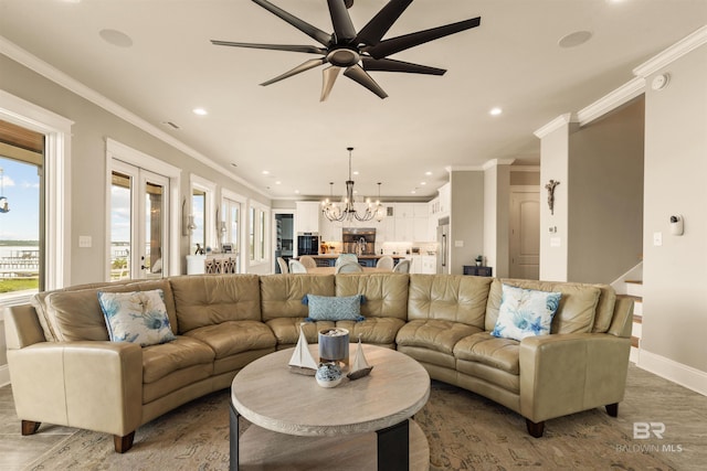 2282 W W Beach Blvd, Gulf Shores, AL 36542 - living area with a chandelier, recessed lighting, a ceiling fan, and ornamental molding