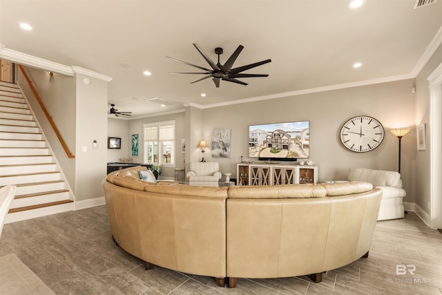2282 W W Beach Blvd, Gulf Shores, AL 36542 - living room with ceiling fan, recessed lighting, ornamental molding, and stairway