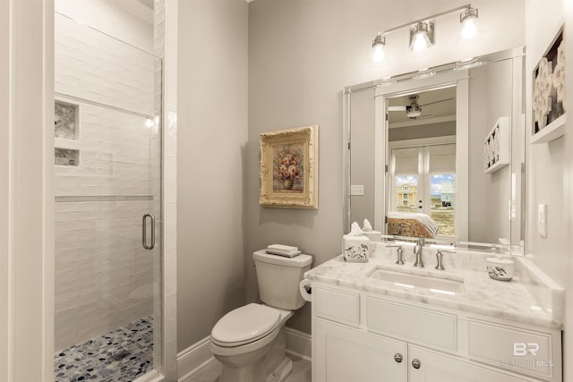 2282 W W Beach Blvd, Gulf Shores, AL 36542 - bathroom featuring a stall shower, vanity, connected bathroom, and ceiling fan