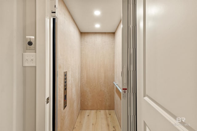 2282 W W Beach Blvd, Gulf Shores, AL 36542 - elevator with wood finished floors and recessed lighting