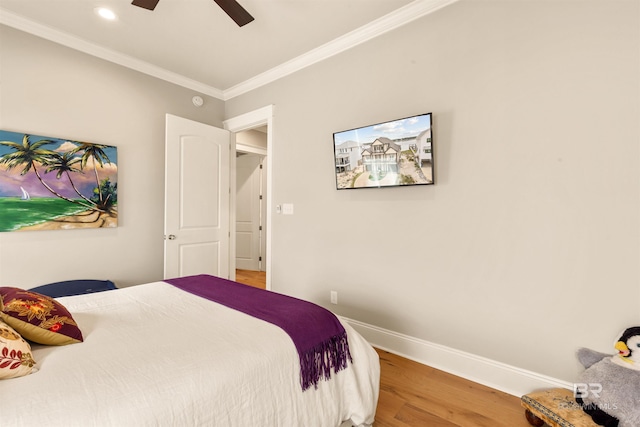 2282 W W Beach Blvd, Gulf Shores, AL 36542 - bedroom featuring wood finished floors, ornamental molding, a ceiling fan, and recessed lighting
