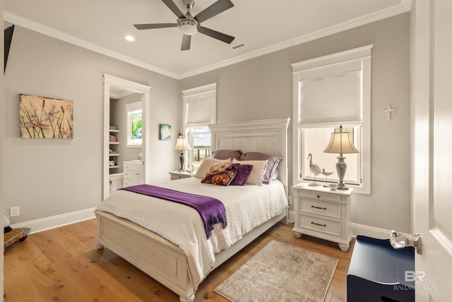 2282 W W Beach Blvd, Gulf Shores, AL 36542 - bedroom featuring light wood finished floors, crown molding, ensuite bathroom, recessed lighting, and ceiling fan