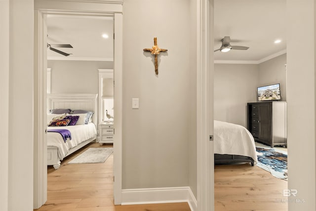 2282 W W Beach Blvd, Gulf Shores, AL 36542 - hallway featuring ornamental molding, wood finished floors, and recessed lighting