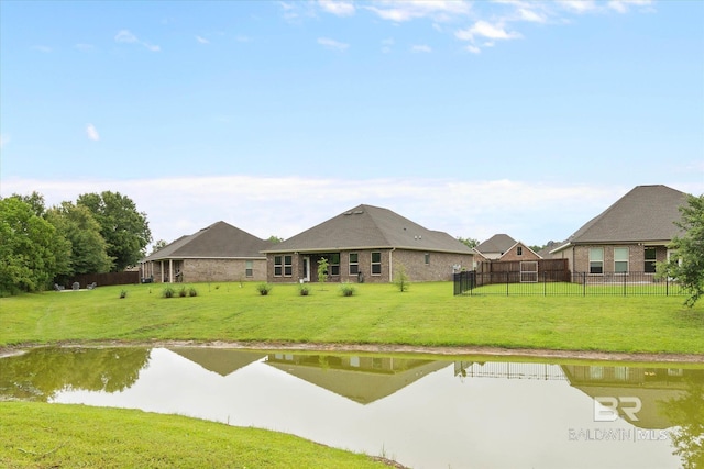 14437 Chenin Blanc Dr, Silverhill, AL 36576 - rear view of property with brick siding and a water view