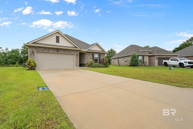 14437 Chenin Blanc Dr, Silverhill, AL 36576 - view of front of house featuring brick siding, a front lawn, a garage, and concrete driveway