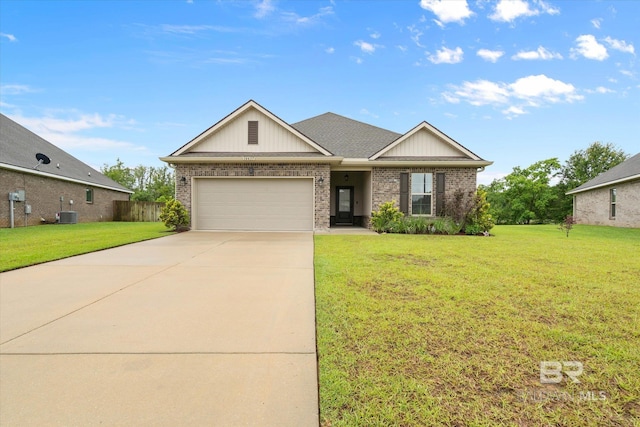 14437 Chenin Blanc Dr, Silverhill, AL 36576 - view of front of home featuring brick siding, driveway, an attached garage, and central AC unit