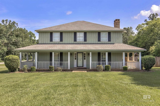 9215 Shiloh Dr, Mobile, AL 36695 - country-style home with a chimney, a porch, a front lawn, and a shingled roof